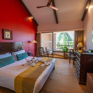 Deluxe Room king bed balcony bathtub